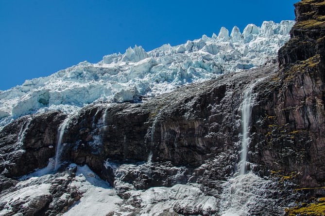 6 day Rainbow Mountain x Ausangate Trek - FlashpackerConnect - Day 1: Tinqui to Upis, with Nevado Ausangate as the opening scene