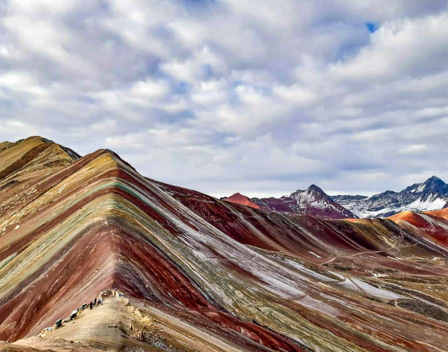From Cusco: Full Day Rainbow Mountain + Red Valley | PRIVATE - Downhill back to the van and the Cusipata lunch buffer