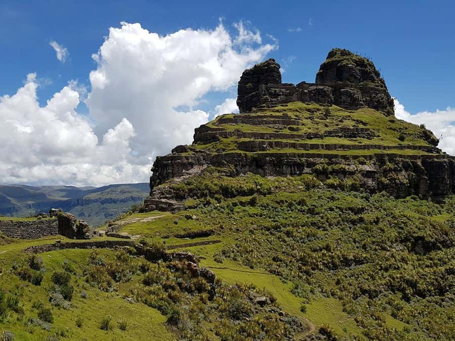 From Cusco: Waqrapukara day tour with meal - Waqrapukara and the four-lagoons views: the payoff you came for