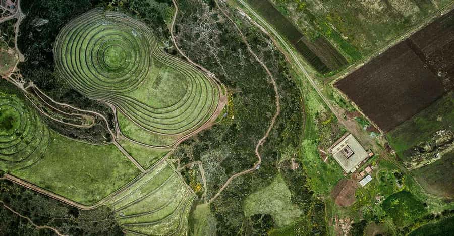 From Ollantaytambo: Moray, Maras, and Chinchero Guided Tour - Moray Circular Terraces: Inca Farming Science You Can Walk