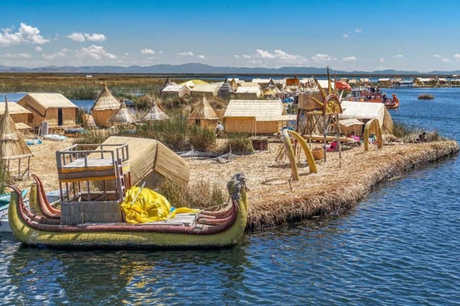 From Puno: Uros and Taquile Islands Full-Day Tour - Uros Floating Islands: Reed Homes, Sponge-Like Floating, and How Life Adapts