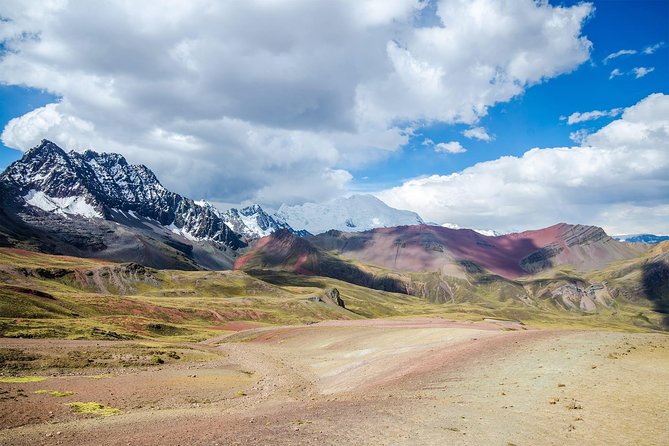 Full Day Rainbow Mountain & Red Valley View Point Tour from Cusco - Vinicunca summit hike: colors, wildlife, and a photo-first approach