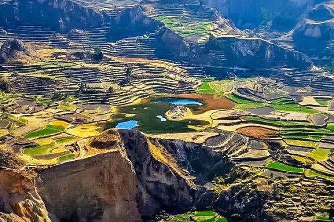 Full Day Tour to Colca Canyon from Arequipa - Abra Patapampa: the volcanic skyline and melting ice views