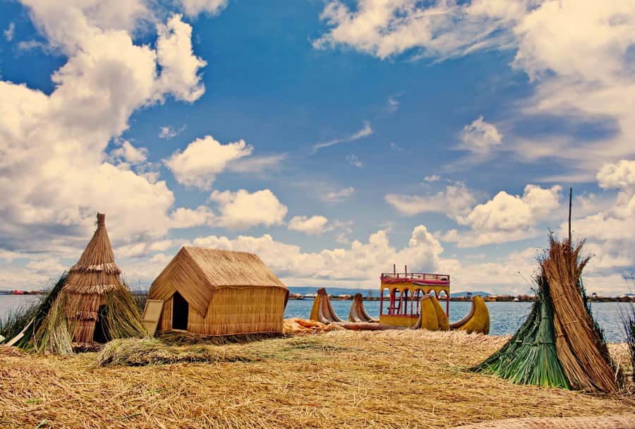 Half Day Guided Lake Titicaca Tour to Uros Floating Islands - Speedboat Views: Lake Titicaca’s Andes Backdrop
