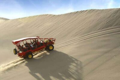Huacachina: Sandboarding and 4x4 Desert Adventure - Getting There: Meeting at the Huacachina Oasis Office and Rolling in a Tubular 4x4