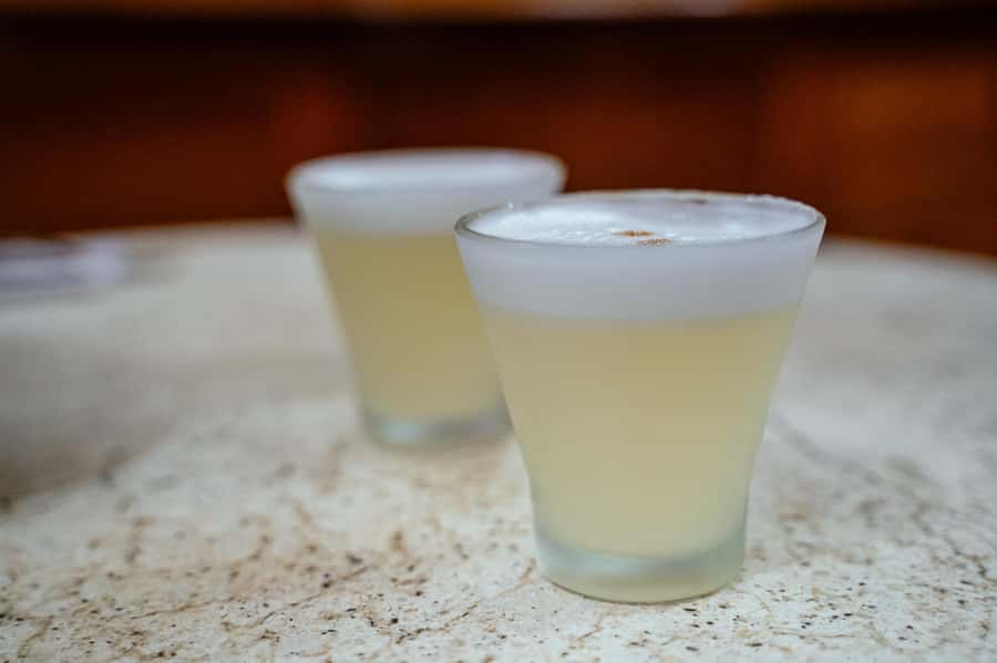 Lima: Flavors and Tradition Walking Tour with Food Tasting - Cordano Tavern: Papita con Huevo and a Traditional Pisco Sour