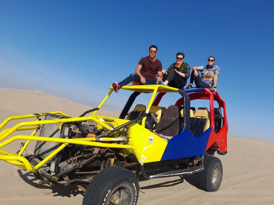 Lima: Huacachina, Winery, & Nazca Lines from Pisco Airport - Huacachina Oasis: palm trees, desert heat, and your buggy moment