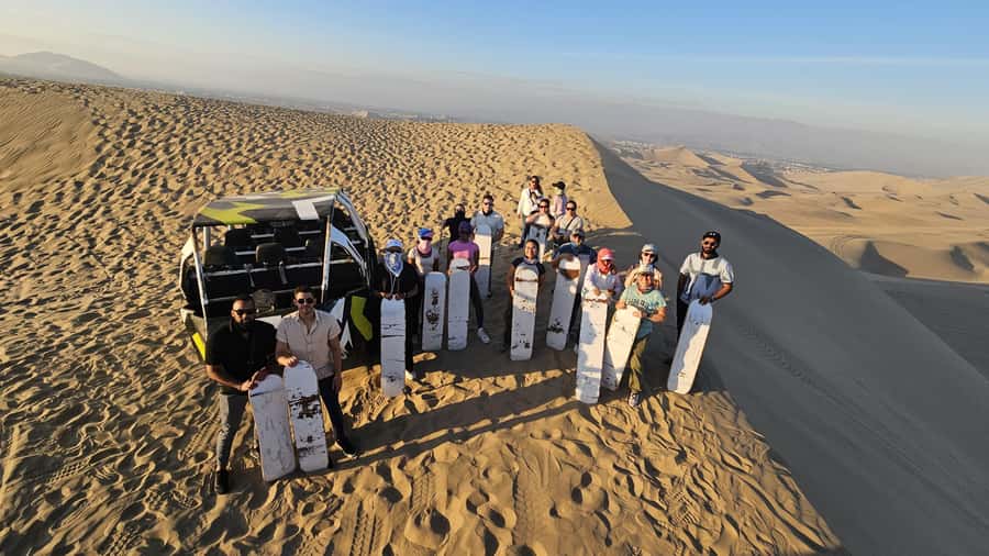 Lima: Paracas & Huacachina Oasis Day Trip with Wine & Dunes - Dune buggy rides and sandboarding: what the adrenaline really feels like