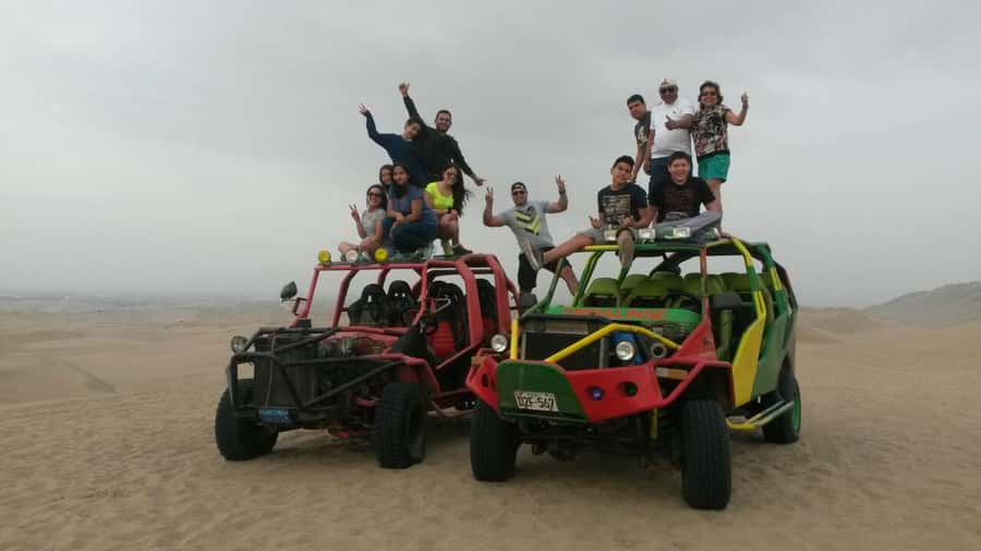 Paracas or Pisco: Private Huacachina Oasis Tour & Buggy Ride - Arriving at Huacachina Oasis: Palm Trees, Lagoon Views, and That Desert Contrast